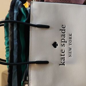Kate Spade crossbody bag with drawstring interior